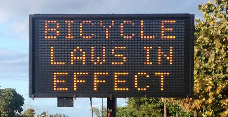 Bicycle Laws in Effect sign